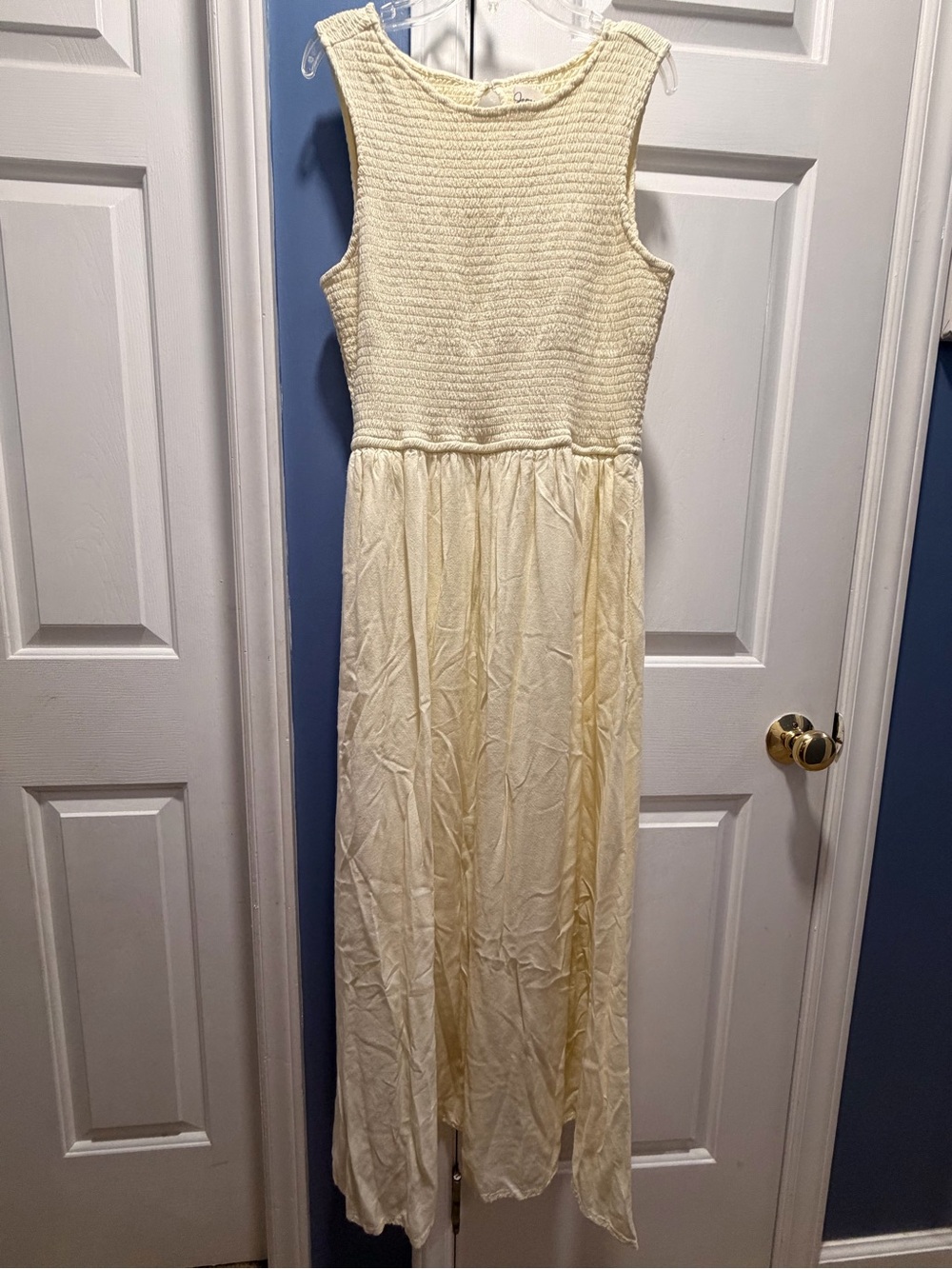 Sleeveless Cream Maxi Dress with Textured Bodice